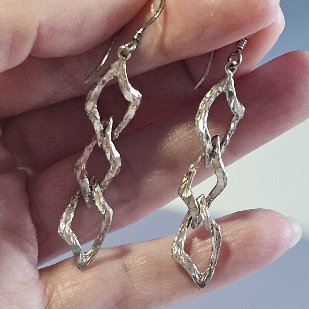 MJ Sterling Silver Dangling Earrings